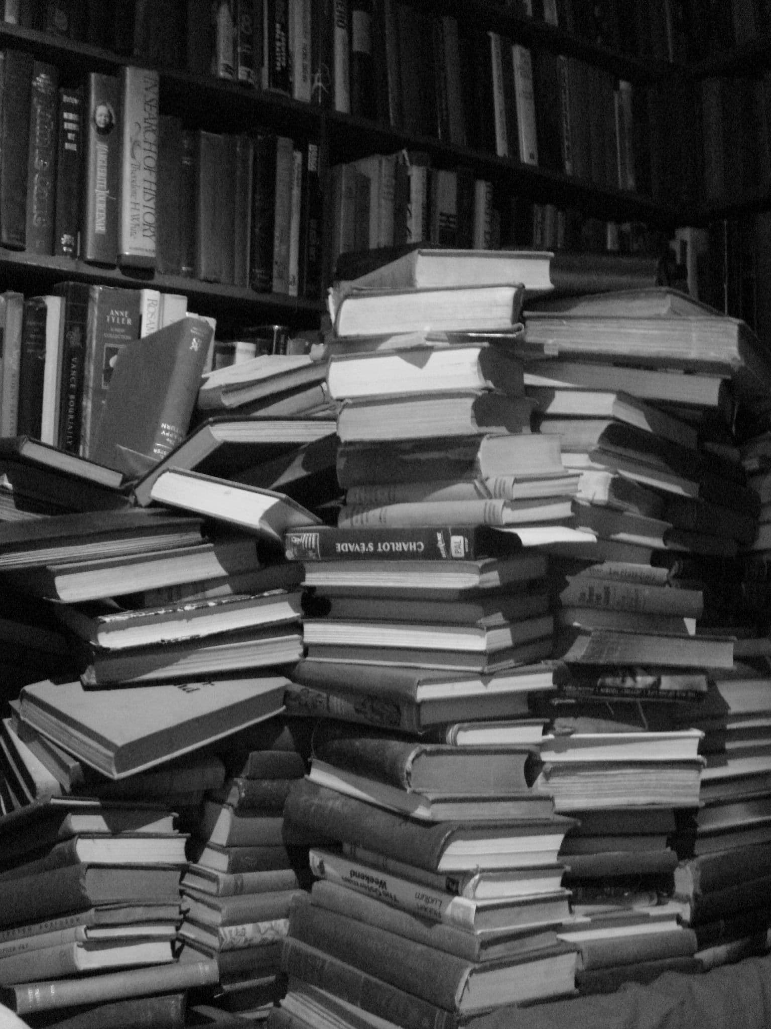 s&amp;co books... some old, some new, all fun to look through. A favorite bookstore in the latin quarter of many english-speakers (and readers). There´s something lonely about a stack of old dusty books... but still hopeful. Attribute to "Evan Lawrence Bench"