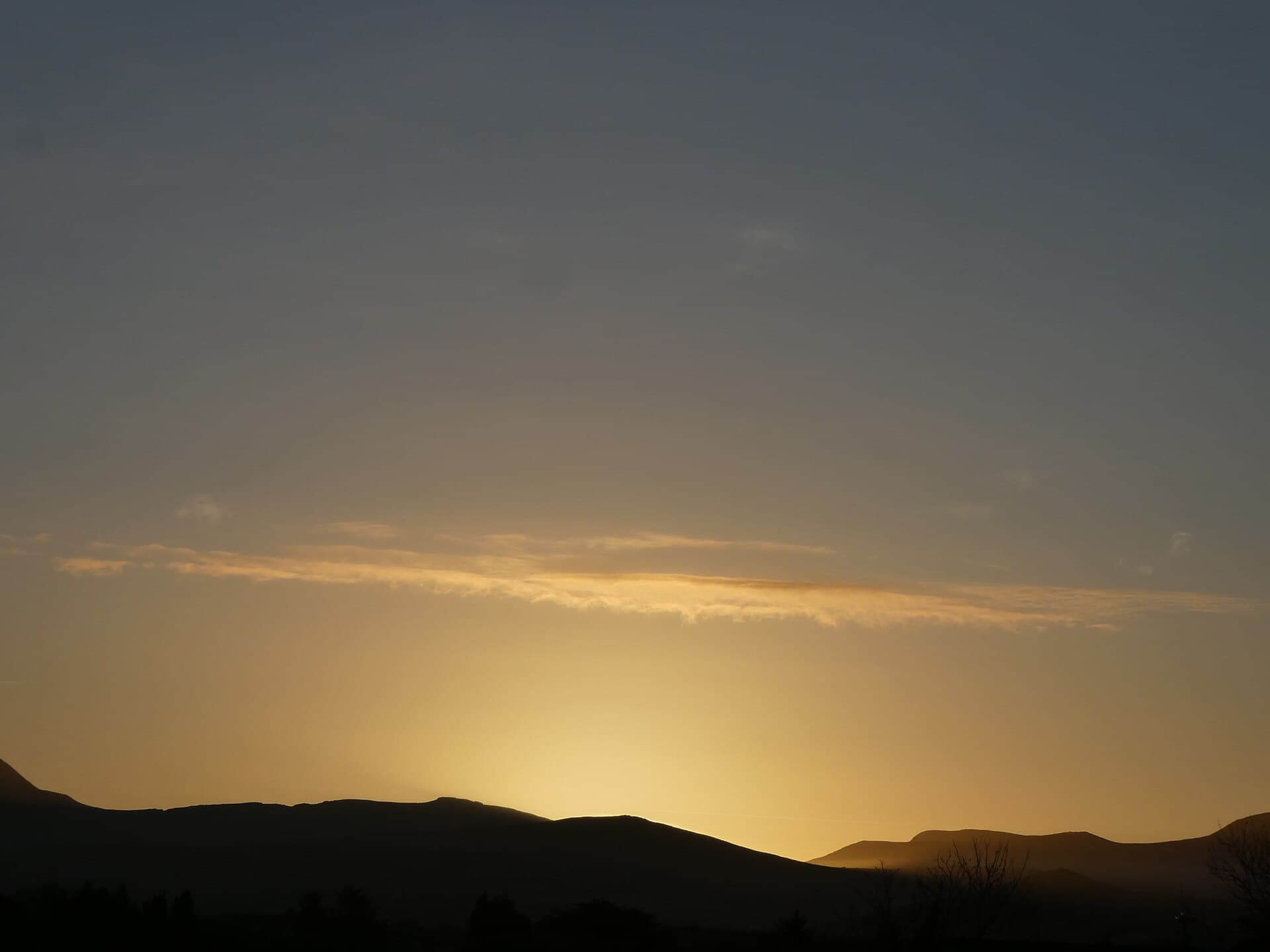 Winter dawn over the Slieve Mish mountains, viewed from Aughacasla, east of Castlegregory.