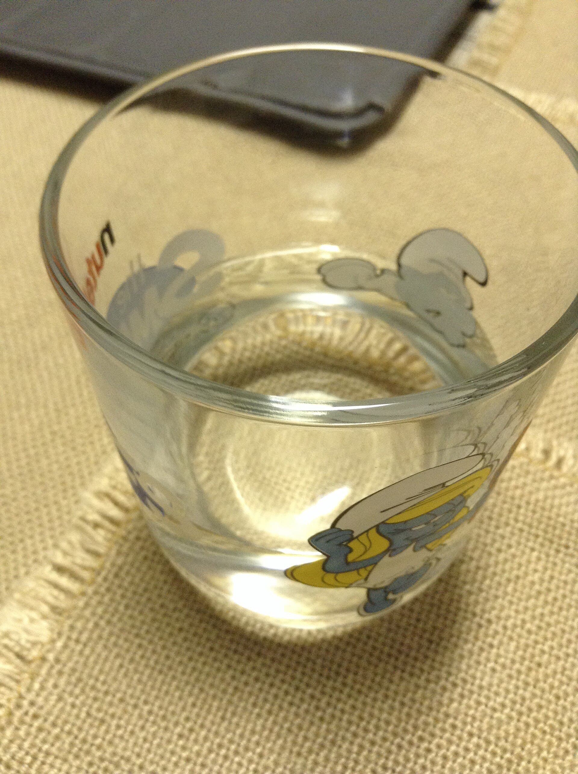A glass of water.