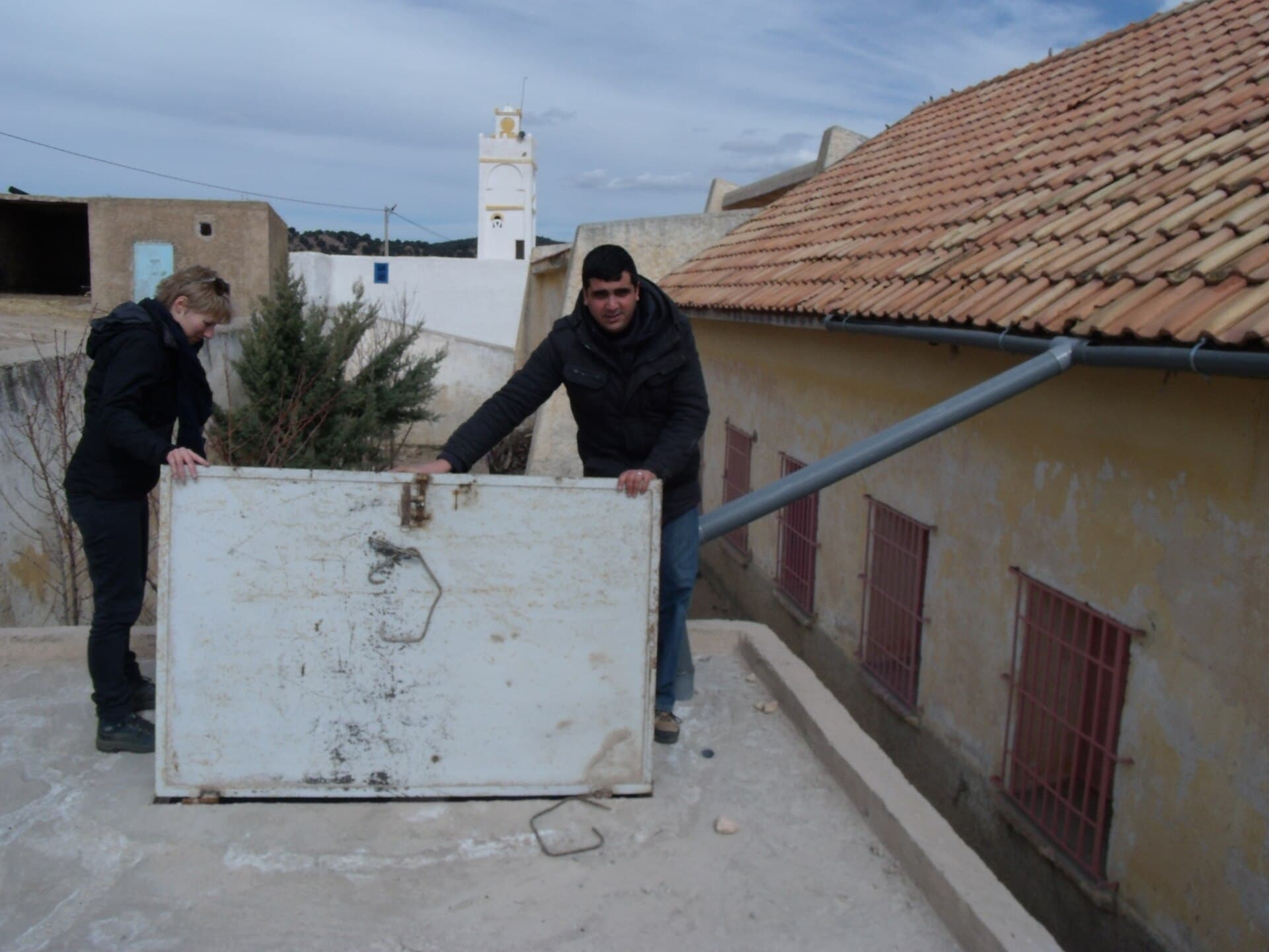 opening the rainwater harvesting tank